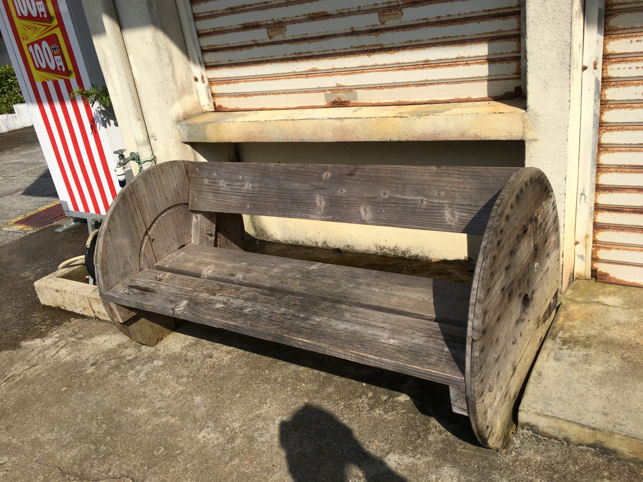 The benches next to the Hendo community are the village's resting place. In the evenings, young people get together and drink a lot. Sometimes they serve homemade food made by the head of the community.